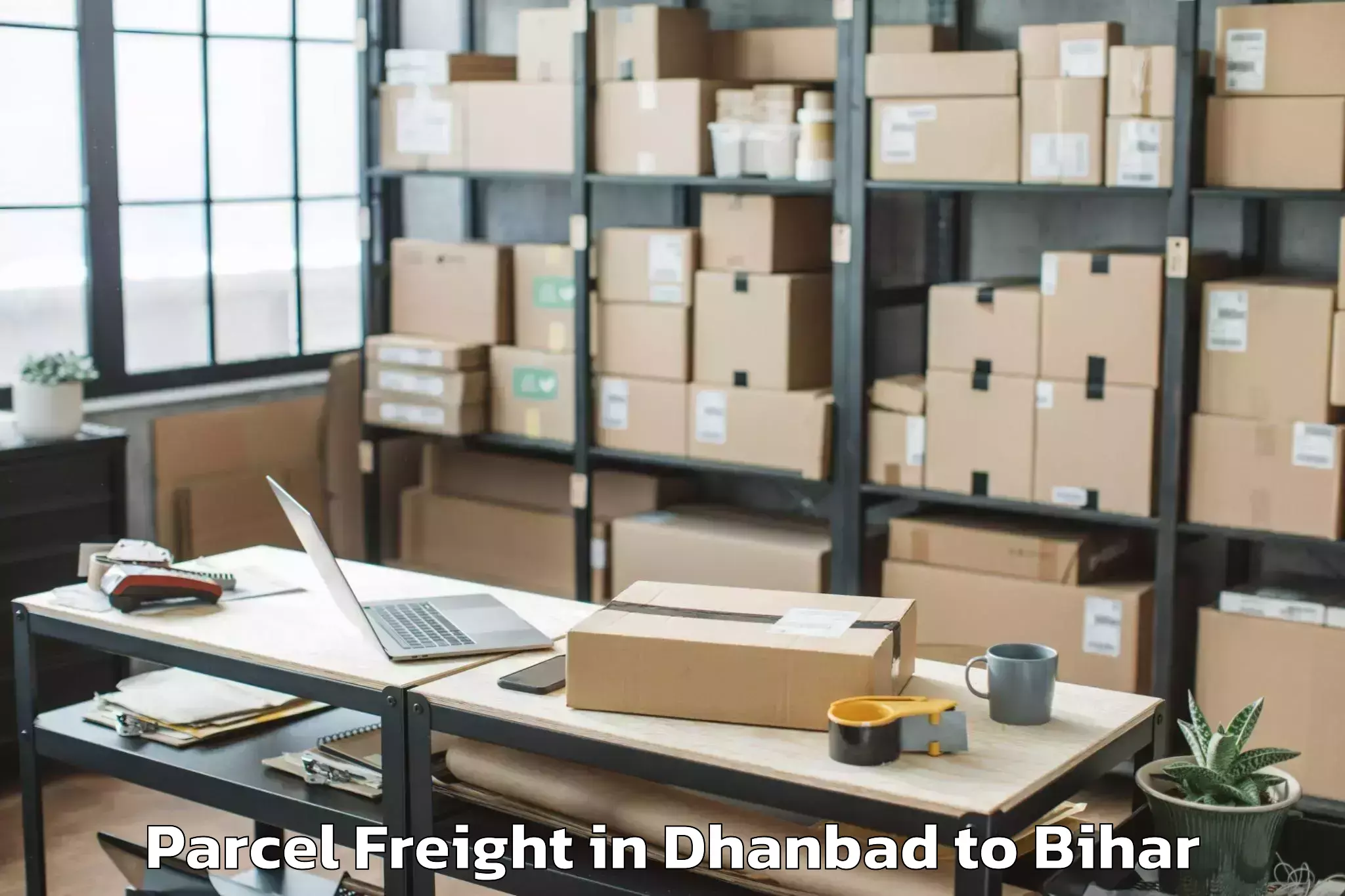 Book Dhanbad to Tetaria Parcel Freight Online